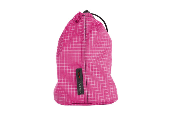 A Size 2 Cerise (bright pink with white grid) 200 Halcyon Travel Stuff Sack.